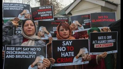 PDP supporters hold placards and raise slogans during a protest in Srinagar against the assault of a Kashmiri shawl seller in Dehradun on Saturday. (Syed Waseem Andrabi) PDP supporters hold placards and raise slogans during a protest in Srinagar against the assault of a Kashmiri shawl seller in Dehradun on Saturday. (Syed Waseem Andrabi)