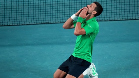 Novak Djokovic celebrates after beating Jannik Sinner at the Australian Open. (AP)