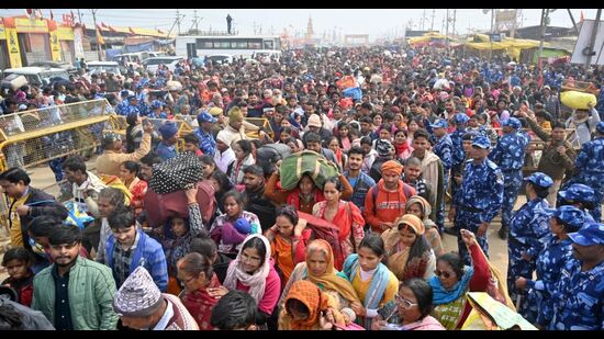 Devotees arriving in large numbers for the Maghi Purnima bathing in the Magh Mela area in Prayagraj on Saturday. (Anil Kumar Maurya/HT)