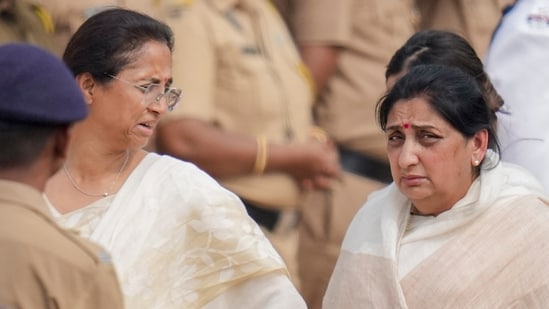 NCP leader Supriya Sule and Sunetra Pawar, wife of Maharashtra Deputy Chief Minister Ajit Pawar, during his last rites, held with full state honours at Vidya Prathishtan ground, at Baramati in Pune district, Thursday, (PTI File)