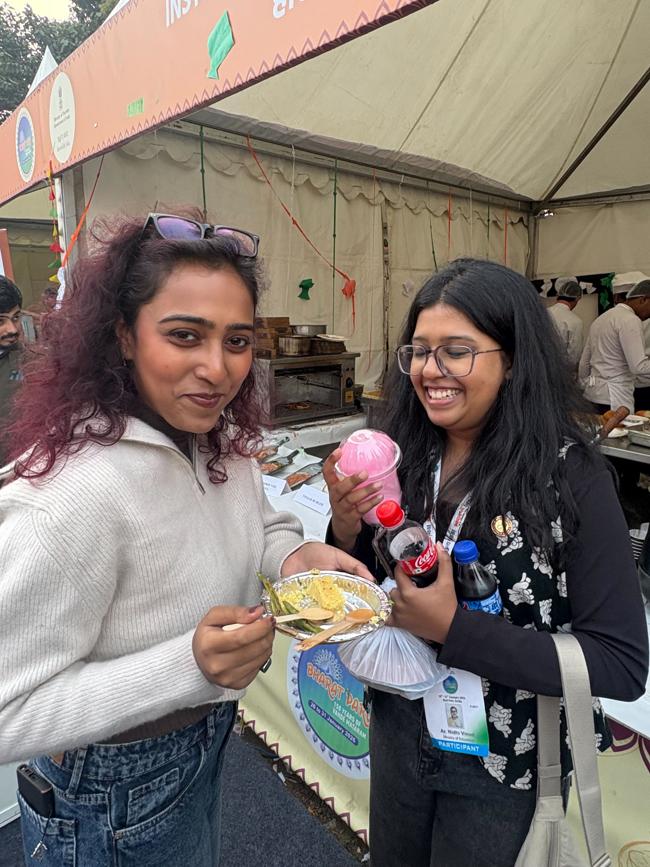 Ishita Chaurasiya, a Gurugram-based architect, enjoys the food at Bharat Parv with her friend. Ishita Chaurasiya, a Gurugram-based architect, enjoys the food at Bharat Parv with her friend.