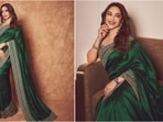 Madhuri Dixit showcases timeless style in gorgeous green saree. Madhuri Dixit showcases timeless style in gorgeous green saree.