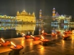A view of the illuminated Golden Temple on the occasion of birth anniversary of Guru Har Rai in Amritsar on Saturday. (Sameer Sehgal/HT)