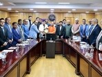 Chief minister Yogi Adityanath holds a meeting with state-level industry organisations and entrepreneurs, in Lucknow on Saturday. (@CMOfficeUPX/ANI Photo)
