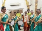 Gokul Chandra Das and the women dhakis. (HT PHOTO)