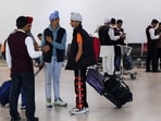 Passengers talk with airport authorities in the thermal-scanning area at Soekarno Hatta International Airport. 