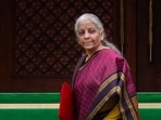 New Delhi: Finance Minister Nirmala Sitharaman with the digital tablet, enclosed in a traditional red 'bahi-khata' style pouch, at the Parliament premises before the presentation of the �Union Budget 2026-27�, in New Delhi, Sunday, Feb. 1, 2026. (PTI Photo/Shahbaz Khan)(PTI02_01_2026_000069A) New Delhi: Finance Minister Nirmala Sitharaman with the digital tablet, enclosed in a traditional red 'bahi-khata' style pouch, at the Parliament premises before the presentation of the �Union Budget 2026-27�, in New Delhi, Sunday, Feb. 1, 2026. (PTI Photo/Shahbaz Khan)(PTI02_01_2026_000069A)