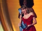 Taylor Swift reacts on stage during the 67th Annual Grammy Awards in Los Angeles