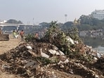 Waste being removed from the Gomti embankment near Jhulelal Vatika Park and Katki Mela ground. (Deepak Gupta/HT) Waste being removed from the Gomti embankment near Jhulelal Vatika Park and Katki Mela ground. (Deepak Gupta/HT)