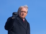 President Donald Trump raises a fist before boarding Air Force One earlier this week