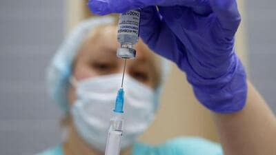 A medical worker fills a syringe with Sputnik V (Gam-COVID-Vac) vaccine before administering an injection during the vaccination against the coronavirus disease (COVID-19) at a clinic in the town of Domodedovo near Moscow, Russia December 3, 2020. REUTERS/Maxim Shemetov (REUTERS) A medical worker fills a syringe with Sputnik V (Gam-COVID-Vac) vaccine before administering an injection during the vaccination against the coronavirus disease (COVID-19) at a clinic in the town of Domodedovo near Moscow, Russia December 3, 2020. REUTERS/Maxim Shemetov (REUTERS)