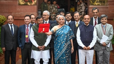 Earlier in 2024, Nirmala Sitharaman donned a blue tussar silk saree featuring delicate Kantha embroidery. This traditional running stitch from West Bengal added a layer of storytelling to her ensemble. (File Photo/PTI) Earlier in 2024, Nirmala Sitharaman donned a blue tussar silk saree featuring delicate Kantha embroidery. This traditional running stitch from West Bengal added a layer of storytelling to her ensemble. (File Photo/PTI)