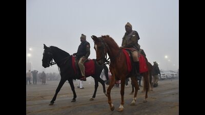 Police personnel kept vigil despite the fog at the Sangam on the occasion of the ‘Maghi Purnima’ festival (PTI)