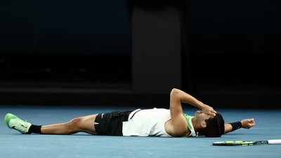 Carlos Alcaraz held his nerve and prevailed to win the Australian Open in the end. He became the youngest player ever to win the career Grand Slam. (REUTERS)