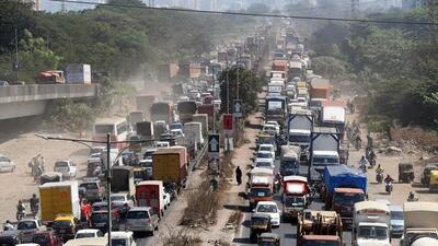 Thane, India - January 16, 2021: The work of installing iron girders on the Thane Kopari railway bridge (new construction bridge) on Mumbai-Nashik Express Highway, Thane will be done for two consecutive days at night on Saturday and Sunday. This work has led to traffic changes. The Bhiwandi bypass road in Thane has been severely congested as heavy traffic near Majiwada from the Kopari bridge has been diverted to Thane Check Naka, Kalwa, Sheelphata and Navi Mumbai, at Thane, Mumbai, India, on Saturday, January 16, 2021. (Praful Gangurde/ HT Photo) (HT PHOTO) Thane, India - January 16, 2021: The work of installing iron girders on the Thane Kopari railway bridge (new construction bridge) on Mumbai-Nashik Express Highway, Thane will be done for two consecutive days at night on Saturday and Sunday. This work has led to traffic changes. The Bhiwandi bypass road in Thane has been severely congested as heavy traffic near Majiwada from the Kopari bridge has been diverted to Thane Check Naka, Kalwa, Sheelphata and Navi Mumbai, at Thane, Mumbai, India, on Saturday, January 16, 2021. (Praful Gangurde/ HT Photo) (HT PHOTO)