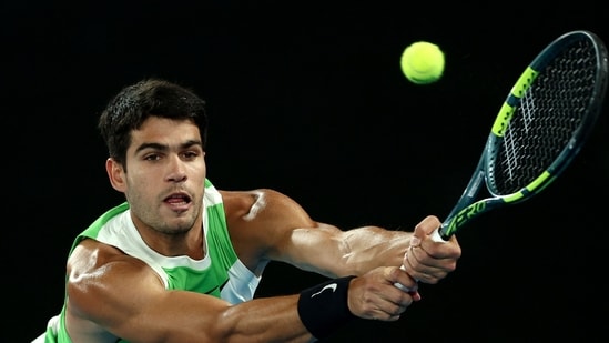Carlos Alcaraz, 22, won his maiden Australian Open title on Sunday (AFP)