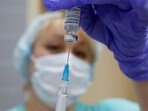 A medical worker fills a syringe with Sputnik V (Gam-COVID-Vac) vaccine before administering an injection during the vaccination against the coronavirus disease (COVID-19) at a clinic in the town of Domodedovo near Moscow, Russia December 3, 2020. REUTERS/Maxim Shemetov (REUTERS)