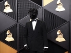 Let's take a detailed look at the masked man's ensemble!