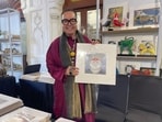 Kolkata’s Sounak Chakraverti with one of his artist’s work at Sanatkada
