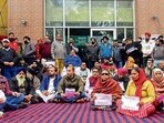 Residents of Dhoka Mohalla protest outside MC’s Zone D office in Ludhiana on Monday. (Gurpreet Singh/HT)