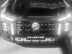 The MG Majestor teaser highlights the SUV’s upright stance and full-size proportions, positioning it above the Gloster as the brand’s new flagship ICE offering for India