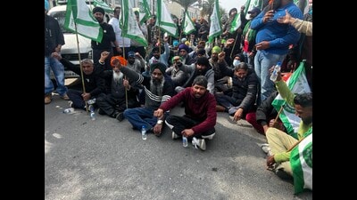 Farmers under the banner of the BKU (Sidhupur) along with the villagers of Jamsher village staged a protest against the construction of a bio-CNG plant in the fodder market of Jamsher Dairy Complex on Monday. (HT Photo)
