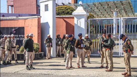 Security personnel stand guard in Imphal (ANI)