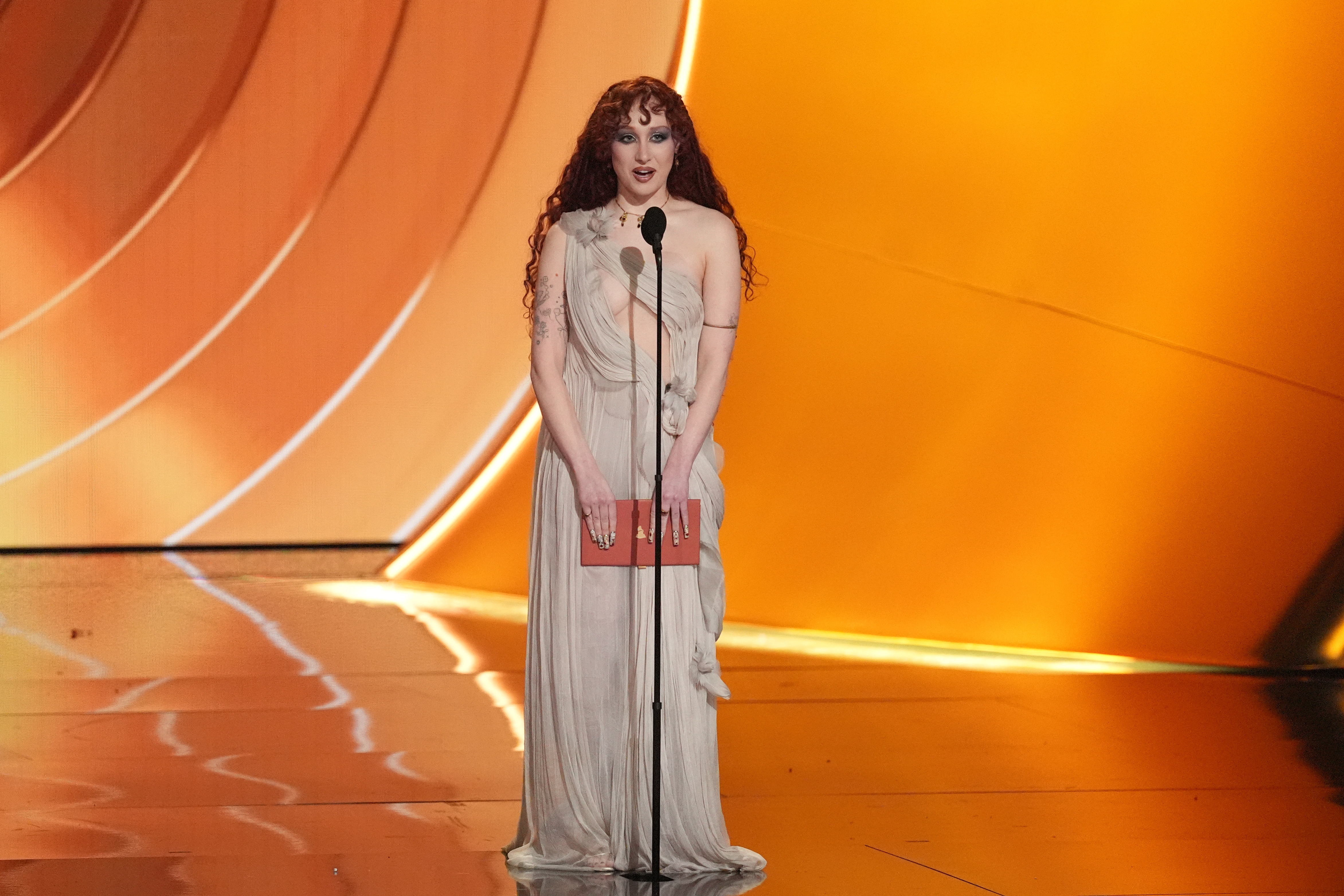 Chappell Roan presents the award for best new artist in a much more modest look. (Chris Pizzello/Invision/AP) Chappell Roan presents the award for best new artist in a much more modest look. (Chris Pizzello/Invision/AP)
