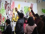 A graffiti workshop by illustrator Byska was held in the afternoon, resulting in sections of walls being covered with multicoloured drawings (Sanchit Khanna/HT)