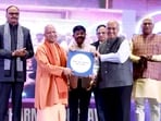 Chief minister Yogi Adityanath, deputy CM Brajesh Pathak and others at the Uttar Pradesh Pharma Conclave 1.0 in Lucknow on Tuesday. (HT)