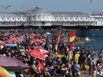 Crowds relax on the beach, during hot weather on Summer bank holiday, in Brighton, Britain, on August 25, 2025. (REUTERS)