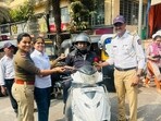Led by assistant police inspector (API) Priyanka Gore, the campaign has been underway since January 1 and focuses on positive reinforcement rather than penalties. (HT)