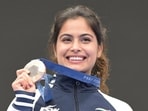 Manu Bhaker poses for a photograph with her bronze medal at the 2024 Paris Olympics. (PTI) Manu Bhaker poses for a photograph with her bronze medal at the 2024 Paris Olympics. (PTI)