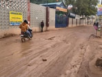 RWAs allege lack of drainage has worsened conditions during monsoon, while officials say repairs have resumed on a limited stretch. (HT Photo)
