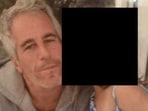 Jeffrey Epstein seen here with a girl's face that has been redacted. 