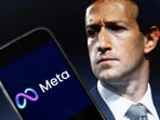 This photo illustration created shows an image of Mark Zuckerberg, CEO of Meta, and an image of the Meta logo.