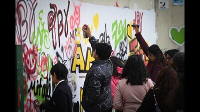 A graffiti workshop by illustrator Byska was held in the afternoon, resulting in sections of walls being covered with multicoloured drawings (Sanchit Khanna/HT) A graffiti workshop by illustrator Byska was held in the afternoon, resulting in sections of walls being covered with multicoloured drawings (Sanchit Khanna/HT)