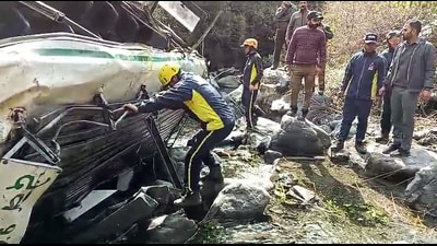 Rescue operation underway after a Himachal roadways bus plunged into a 100 metre gorge at Kuwanu-Meenas road, in Dehradun on Tuesday. (ANI) Rescue operation underway after a Himachal roadways bus plunged into a 100 metre gorge at Kuwanu-Meenas road, in Dehradun on Tuesday. (ANI)