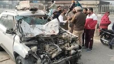 The mangled remains of the car that rammed into two scooters, killing four men near Bhangala in Mukerian sub division around Monday midnight. (HT Photo)