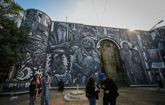 Six new murals, moving art rickshaws, and weekend panels highlight accessibility, urban memory, and ecology at Delhi’s first public art district. (Sanchit Khanna/HT) Six new murals, moving art rickshaws, and weekend panels highlight accessibility, urban memory, and ecology at Delhi’s first public art district. (Sanchit Khanna/HT)