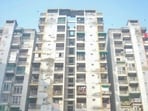 Ghaziabad: People gather after three minor sisters allegedly jumped off the balcony of a ninth-floor flat and died.