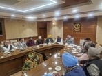 Punjab finance and taxation minister Harpal Singh Cheema chairing a high-level meeting of the Punjab State Traders Commission in Chandigarh on Wednesday. (HT) Punjab finance and taxation minister Harpal Singh Cheema chairing a high-level meeting of the Punjab State Traders Commission in Chandigarh on Wednesday. (HT)