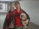 A dog walking dispute in Greater Noida resulted in a public altercation, police action, and a viral video.