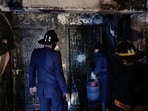 The fire was reported at around 4.14 am on the 10th floor of the Milan Hill building in the Shastri Nagar area. (Praful Gangurde / HT Photo)