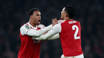 Arsenal's Gabriel Magalhaes celebrates after the match with William Saliba (Action Images via Reuters)