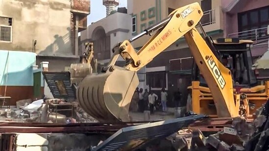 A bulldozer in action in Bareilly. (ANI/File Photo)