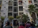 Arun Kumar, who lives on the 10th floor of Tower A4, said he was on his balcony recording content for social media, when he noticed unusual movement in a flat across from him. (Sakib Ali/HT Photo)