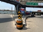 Earlier, 400 such collision cushions to absorb the shock of crashes along dividers of the roads and blackspots were placed city-wide in a three-phased exercise in 2025. (HT)