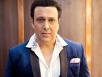 Govinda's manager claims the actor warded off attackers with a gun at his home.