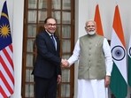 Prime Minister Narendra Modi, shakes hand with his Malaysian counterpart Anwar Ibrahim before their delegation level meeting at Hyderabad House in New Delhi.  (Photo by Arvind Yadav/ Hindustan Times)